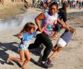 Showdown at Mexican border: US agents fire tear gas at migrants