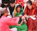 With puja and roadshow, Sonia, Smriti file nominations