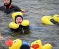 PHOTOS: Thousands of swimmers race in freezing Germany river