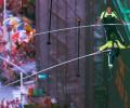 Siblings walk on high wire 25 stories over New York