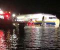 Plane with 143 on board falls into river in US