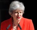 Emotional Theresa May announces resignation