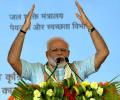 Some people get alarmed on hearing 'Om', 'cow': Modi