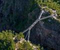 This bridge lets you walk over one of the most stunning waterfalls