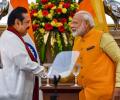 Take forward Tamil reconciliation process: Modi to Rajapaksa