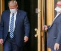 Trump returns to White House, removes mask for photo-op