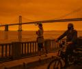 Like a scene from Mars: California skies glow orange as wildfires continue