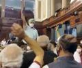 Opposition MPs climb on table, throw papers in Rajya Sabha