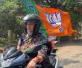 Bengal polls: Smriti Irani leads BJP rally on scooter