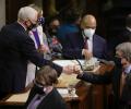 PIX: Fist bumps greet US Congress ratifying Biden win