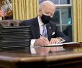 Biden signs order to end Trump's Muslim travel ban