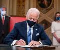 On Day 1, Biden signs 15 executive orders