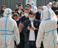 China reports over 100 Covid cases amid virus spike