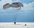 SpaceX capsule with 1st all-civilian crew returns to Earth