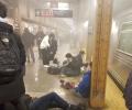 16 injured in New York subway shooting, hunt on for man in gas mask