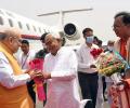 Now, Nitish Receives Amit Shah At Airport