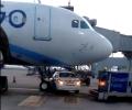 Car goes under IndiGo plane, narrowly avoids collision with nose wheel