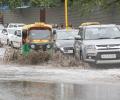 Rains, thunderstorm bring temp down in Delhi; air, road traffic hit