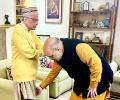 Who Is Amit Shah Taking Blessings From?