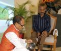 MP CM washes feet of tribal man who was peed on