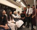 Modi takes metro ride to Delhi University