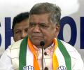 Shettar won't remove photos of Modi, Shah from his office