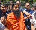 Ramdev, Balkrishna apologise to SC for Patanjali ads