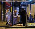 Boy killed, 2 cops among 4 hurt in London sword attack; accused held