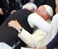 Modi hugs Pope Francis at G7; invites him to India