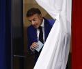 Will Macron retain power? France votes in first round of snap polls