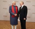 Modi Stands Out In A Room Of Suits