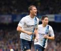 Man City back on top after Dzeko double downs Everton