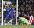 Chelsea go top with Stoke win, City thump Saints