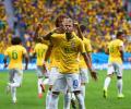 Neymar double helps Brazil through to face Chile