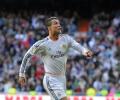 Ronaldo helps lift Real to the top of La Liga