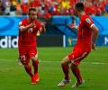 Shaqiri hat-trick steers Swiss into last 16