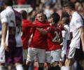 Rooney double helps United lift Old Trafford gloom