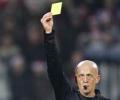 Collina quits over business conflict