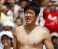 Chinese hurdles champ Liu Xiang pulls out hurt