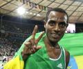 Fraser wins 100 gold, four in row for Bekele