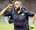 Lisandro hits hat-trick as Lyon qualify