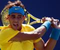 Nadal does it the hard way again in Paris