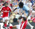 Van Persie accuses Adebayor of 'malicious' stamp