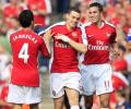 Vermaelen double helps Arsenal thrash Wigan