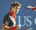 Federer triumphs to seal Swiss win over Italy