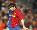 Messi double helps Barcelona rout Atletico