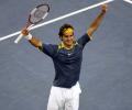 Federer, Clijsters kick off US Open in style