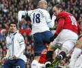 Rooney on target again as Man United go top