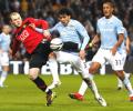 Rooney header puts Man U in League Cup final