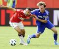 Manchester United stunned by 10-man Kansas City